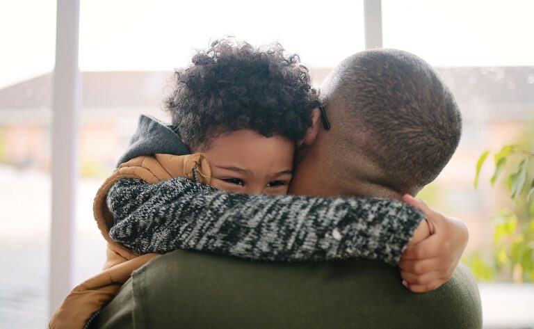 httpscdn.britannica.com59223259-050-5FC11D2ELittle-boy-hugging-father-parent-child.jpg