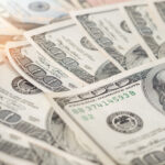 Close up heap of one hundred dollars