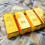 America,Us,Dollar,With,Gold,Bars,,Finance,Saving,Concept,,Investment