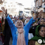 Shiite Muslims gather for a protest march in Srinagar